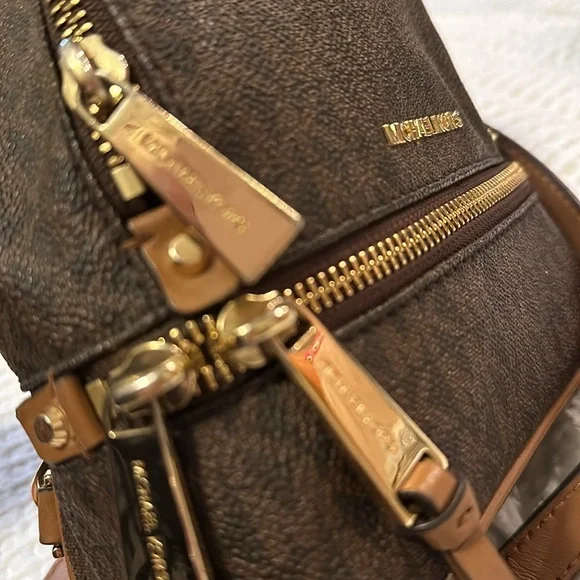 Brown and tan mini backpack. Used - Picture 4 of 5